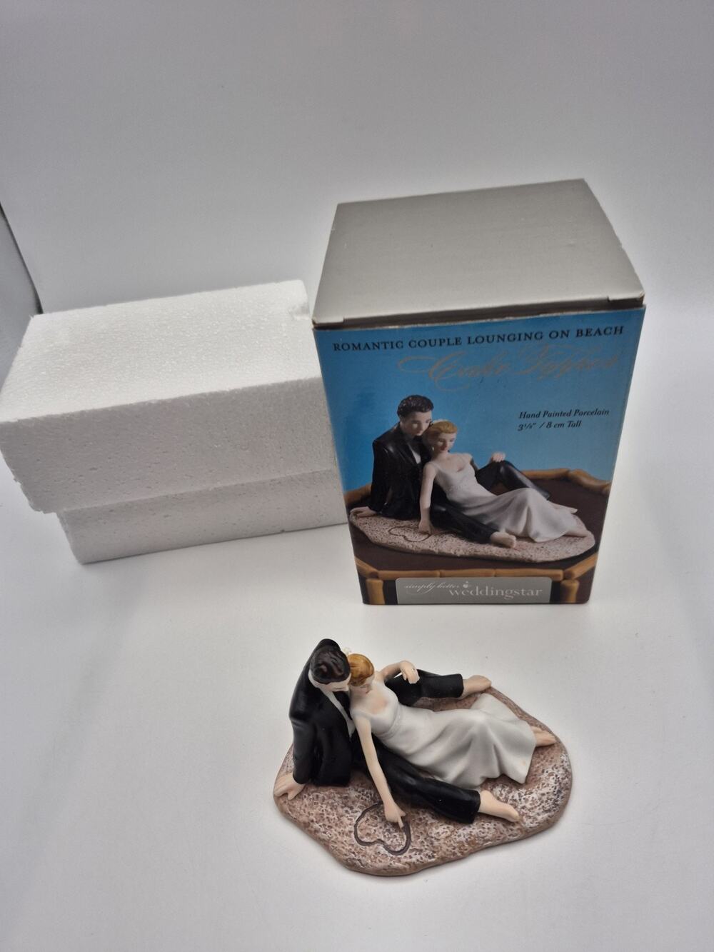Weddingstar Romantic Couple Lounging On Beach Hand Painted Porcelain Cake Topper